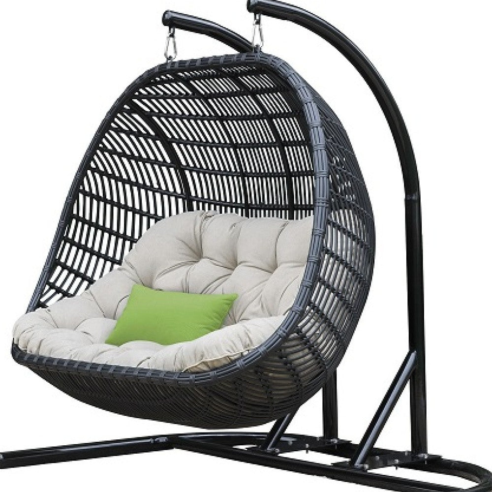 HomeRoots 69" Beige and Black Aluminum Indoor Outdoor Swing Chair with Beige Cushion