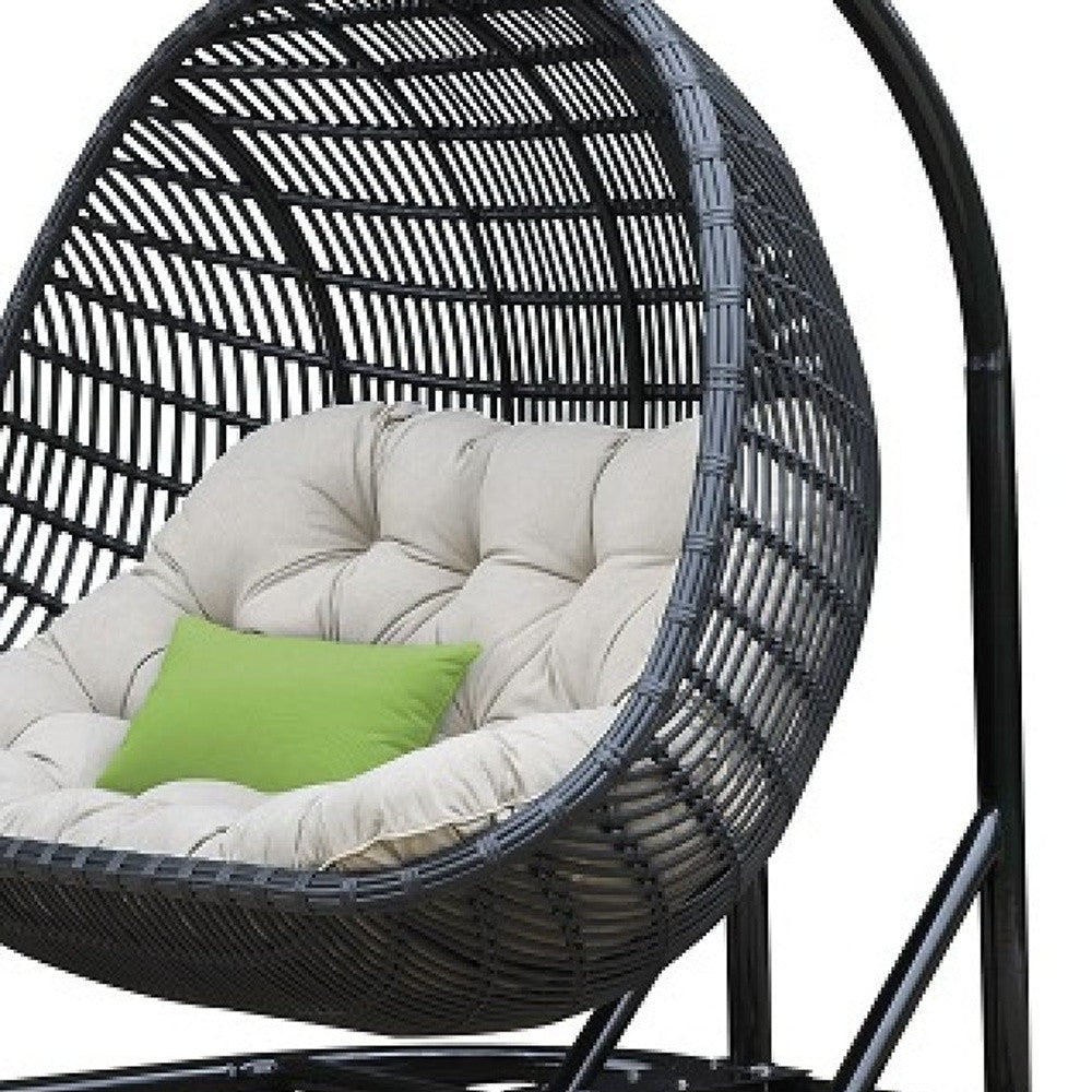 HomeRoots 69" Beige and Black Aluminum Indoor Outdoor Swing Chair with Beige Cushion